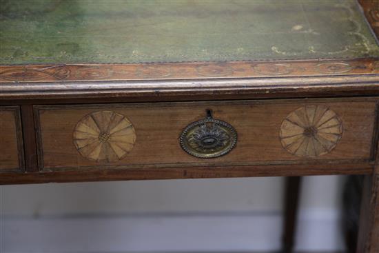 A George III marquetry inlaid satinwood writing table, W.3ft 3in. D.2ft 2in. H.2ft 7in.